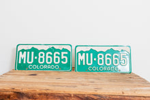 Load image into Gallery viewer, Colorado 1977 License Plate Pair Vintage Wall Hanging Decor - Eagle&#39;s Eye Finds
