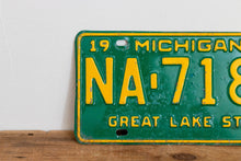 Load image into Gallery viewer, Michigan 1968 License Plate Vintage Wall Hanging Decor John Deere Colors - Eagle&#39;s Eye Finds
