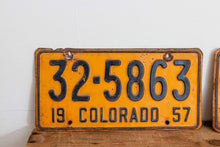 Load image into Gallery viewer, Colorado 1957 License Plate Pair Vintage Wall Hanging Decor - Eagle&#39;s Eye Finds
