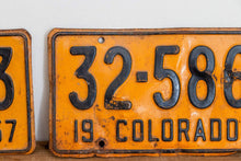 Load image into Gallery viewer, Colorado 1957 License Plate Pair Vintage Wall Hanging Decor - Eagle&#39;s Eye Finds
