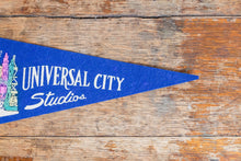 Load image into Gallery viewer, Universal Studios Blue Felt Pennant Vintage Universal City Decor - Eagle&#39;s Eye Finds
