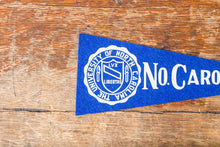 Load image into Gallery viewer, University North Carolina Royal Blue Felt Pennant Vintage Mini College Wall Decor - Eagle&#39;s Eye Finds
