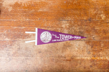 Load image into Gallery viewer, Tower of Peace Florida Felt Pennant Vintage Purple Lake Placid FL Wall Decor - Eagle&#39;s Eye Finds
