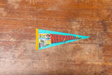 Load image into Gallery viewer, Nebraska State Teal Felt Pennant Vintage NE Wall Decor - Eagle&#39;s Eye Finds
