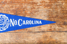 Load image into Gallery viewer, University North Carolina Royal Blue Felt Pennant Vintage Mini College Wall Decor - Eagle&#39;s Eye Finds
