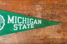 Load image into Gallery viewer, Michigan State University Felt Pennant Vintage College Wall Decor - Eagle&#39;s Eye Finds
