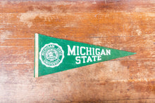 Load image into Gallery viewer, Michigan State University Felt Pennant Vintage College Wall Decor - Eagle&#39;s Eye Finds
