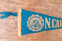 Load image into Gallery viewer, University North Carolina Blue Felt Pennant Vintage Mini College Wall Decor - Eagle&#39;s Eye Finds

