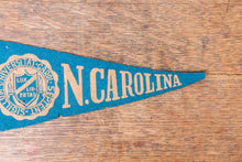 Load image into Gallery viewer, University North Carolina Blue Felt Pennant Vintage Mini College Wall Decor - Eagle&#39;s Eye Finds
